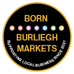A badge saying Born Burleigh Markets
