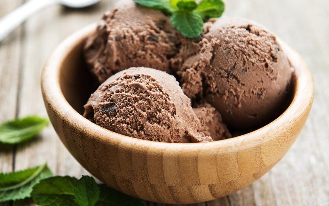 chocolate ice cream in a bowl on a table